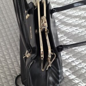 Elegant Black Handbag with Gold Accents